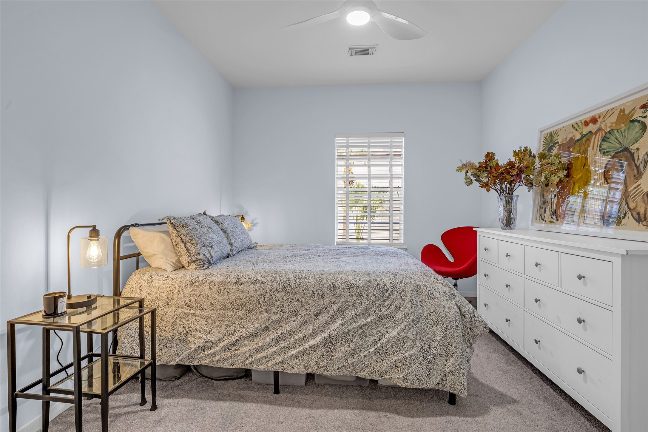 The third bedroom, it has a closet and a ceiling fan.
