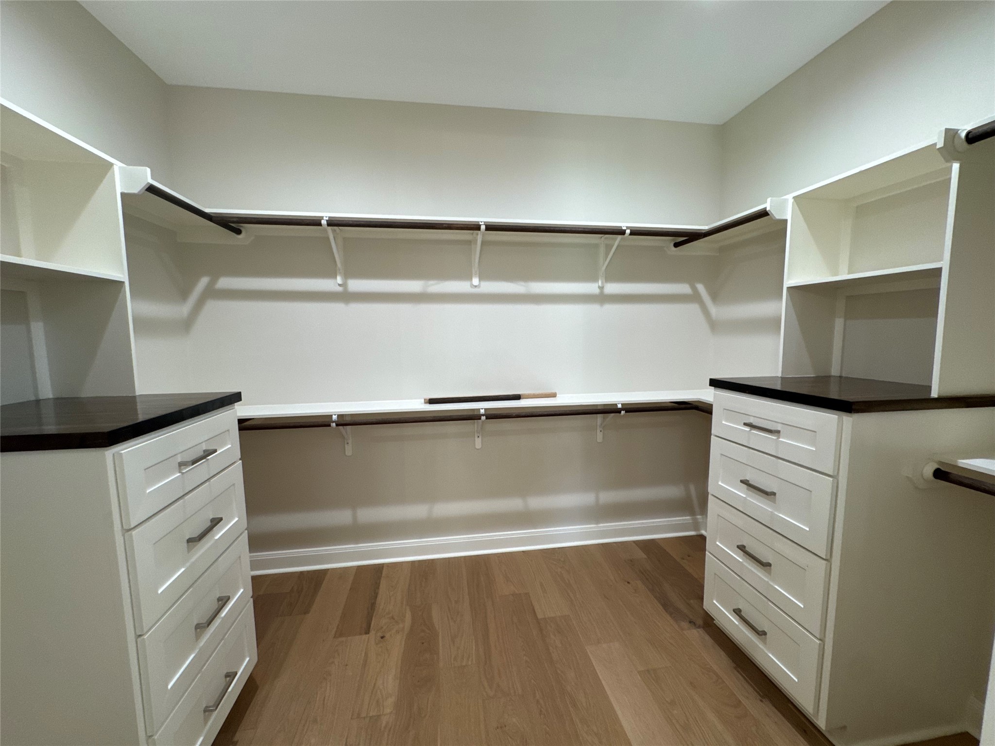 Primary closet w/built-in dressers