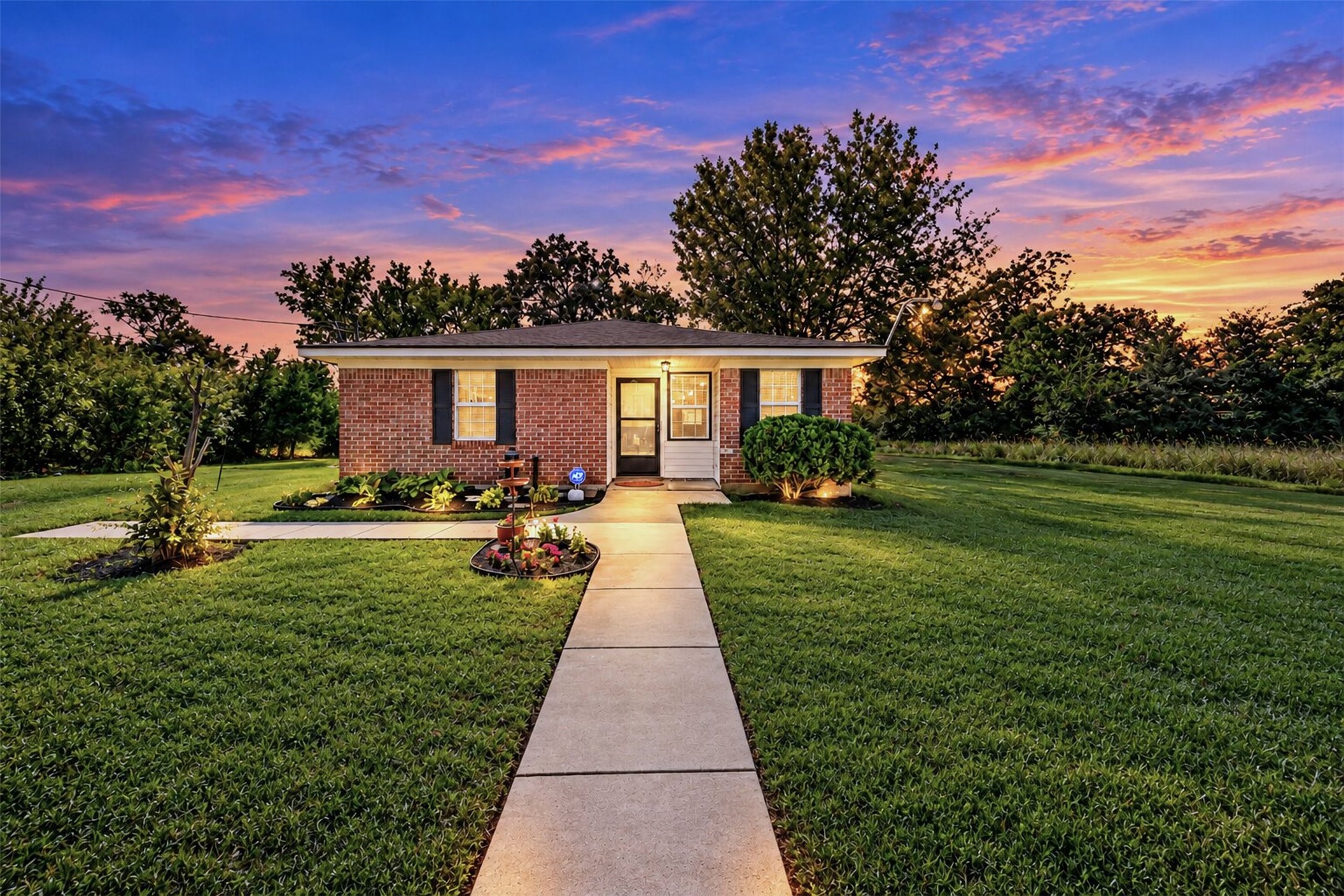 Lovely one story brick home on a large lot. Photos are enhanced to show full potential. Lovely one story brick home on a large lot. Photos are enhanced to show full potential.