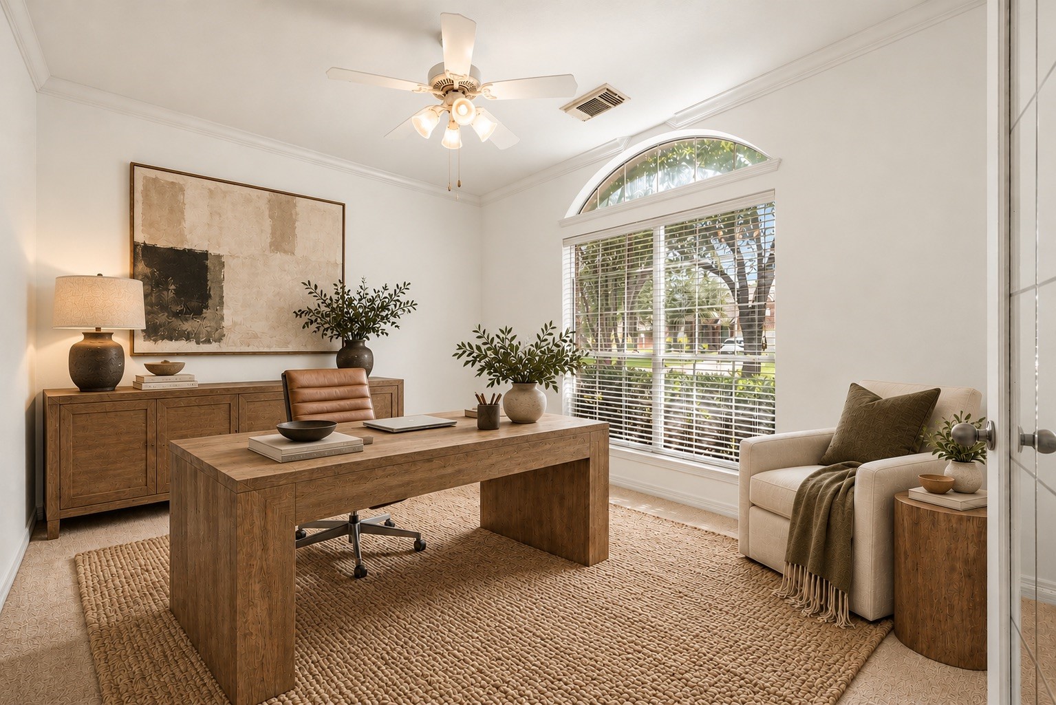 Virtual staging illustrates the office's potential as a calming and composed setting, with room to create a productive environment that feels distinctly your own.