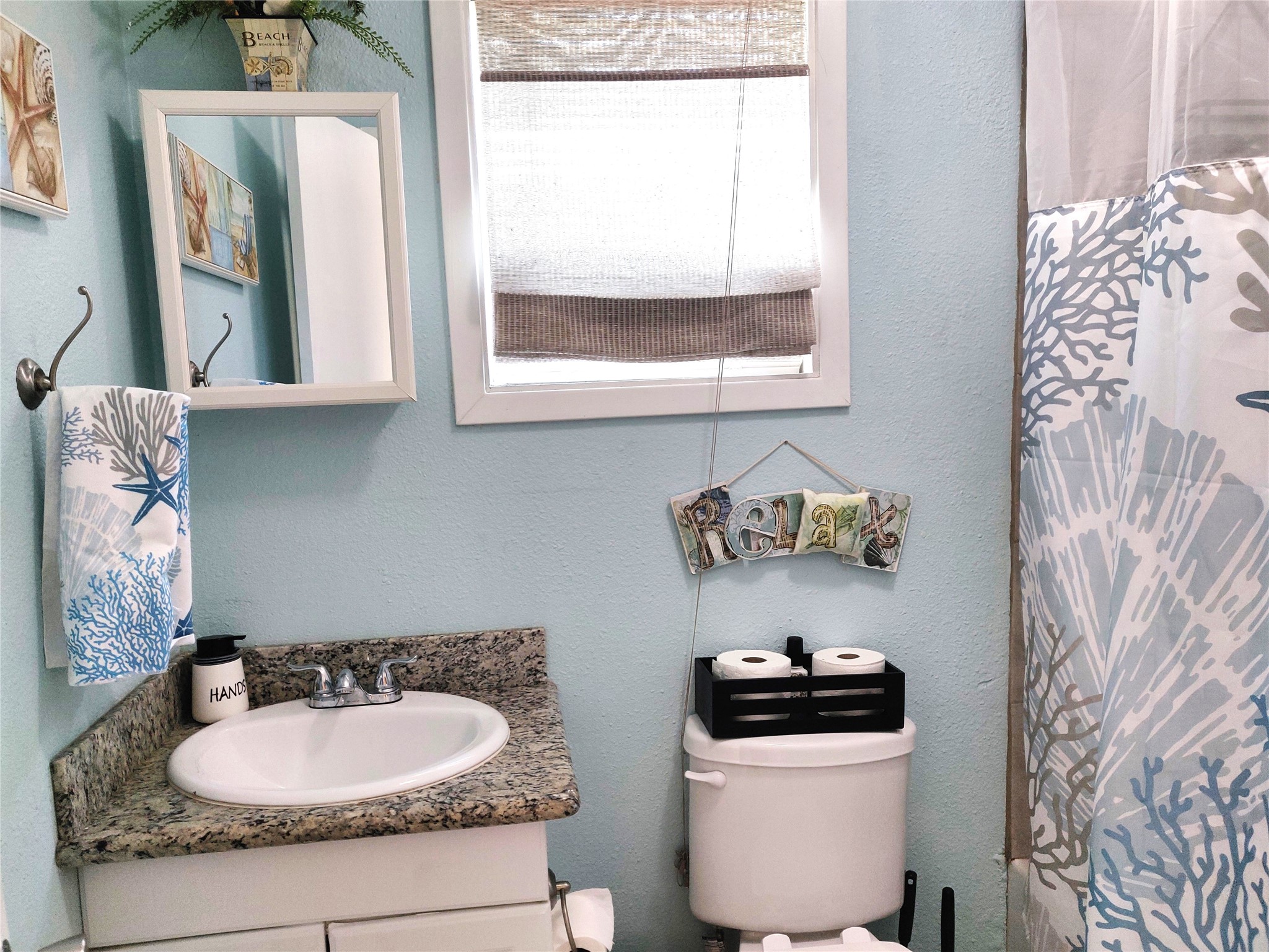 The primary bedroom has an ensuite bathroom with a walk-in shower