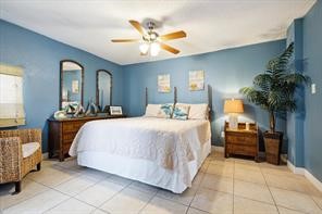 Wake up in this cozy, sunlit bedroom with plush bedding