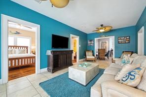 Relax and recharge in this stylish living room, where comfort meets coastal charm Relax and recharge in this stylish living room, where comfort meets coastal charm