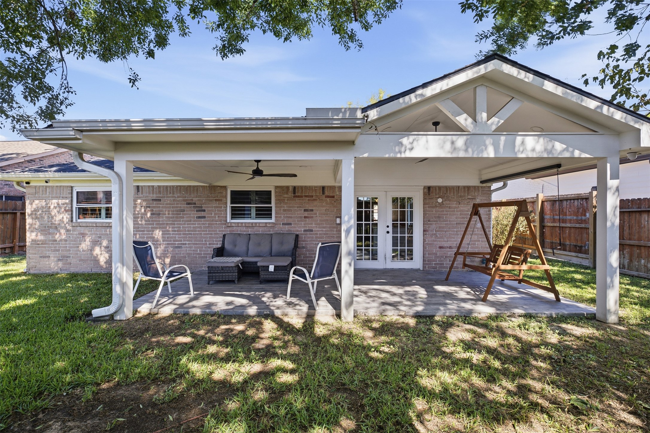 Wow! Huge covered backyard patio provides a shaded outdoor living area with two ceiling fan and plenty of room to relax in the mornings for coffee or after a long day at work or entertaining your special guests!