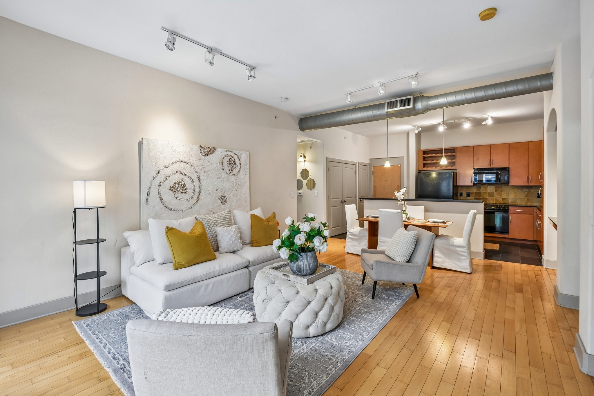 Open floor plan, connects living, dining and kitchen
