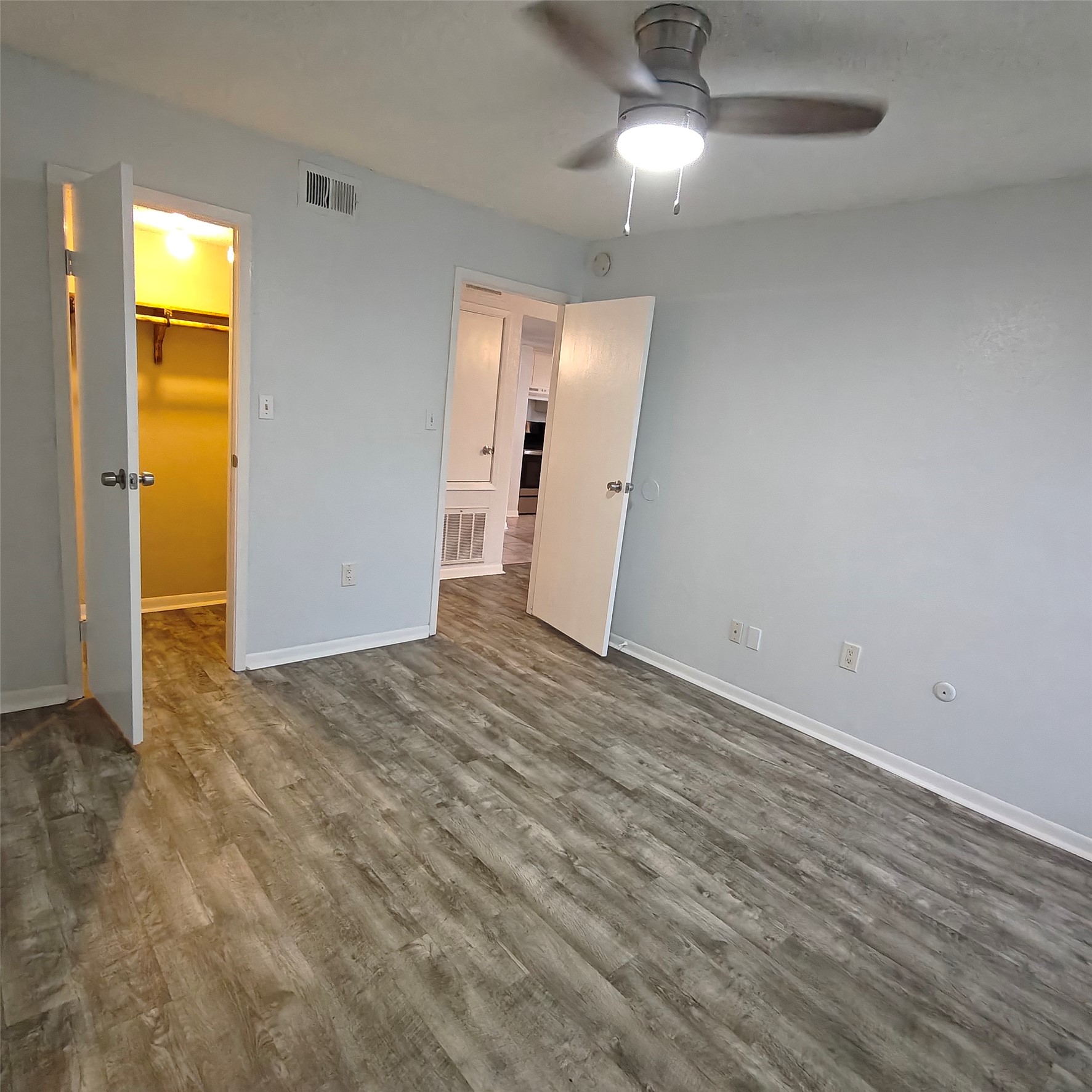 Secondary Bedroom is a great size with walk in closet and a full bath to the opposite of the entry door