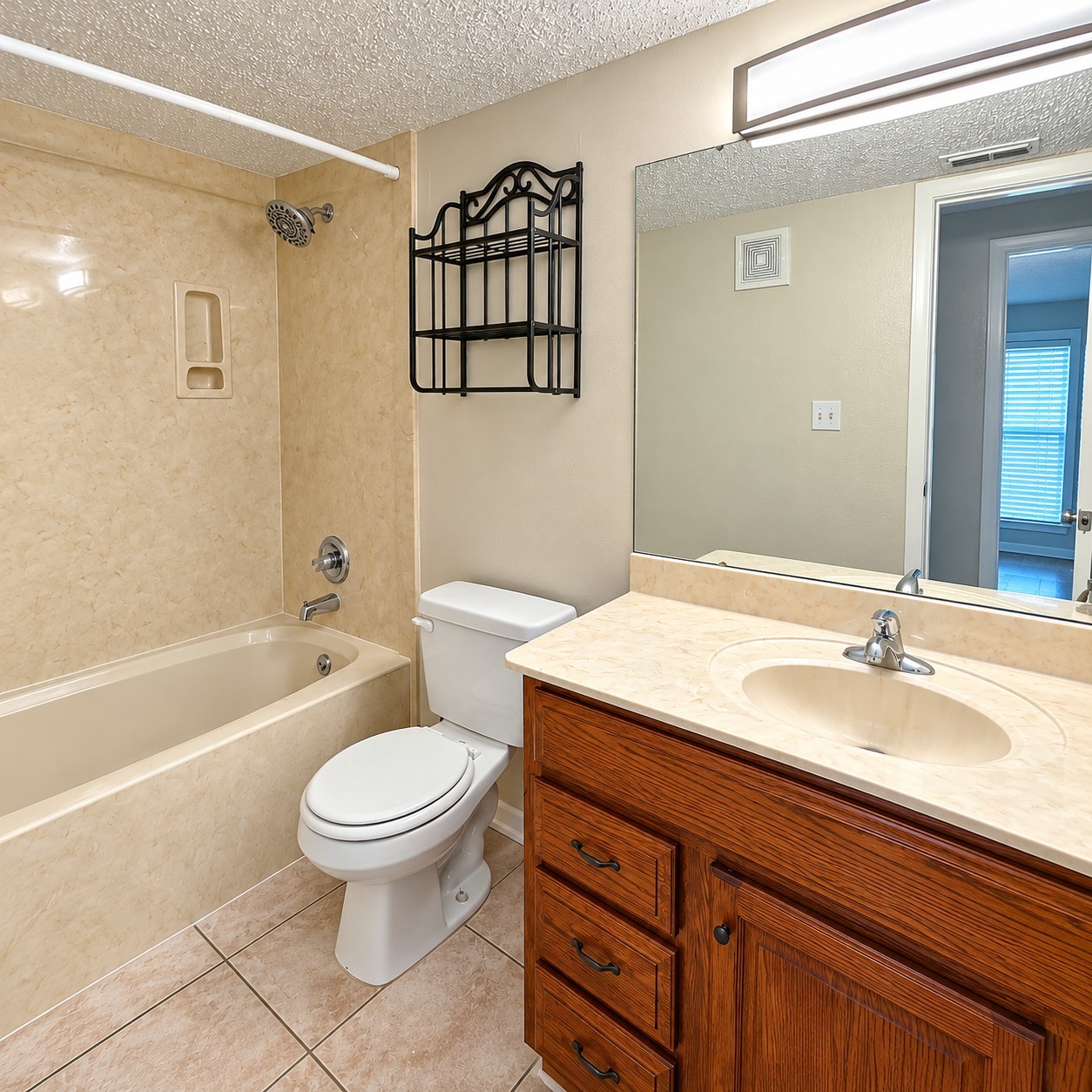 The 2nd bathroom for guests and secondary bedroom patron right across from the secondary bedroom.