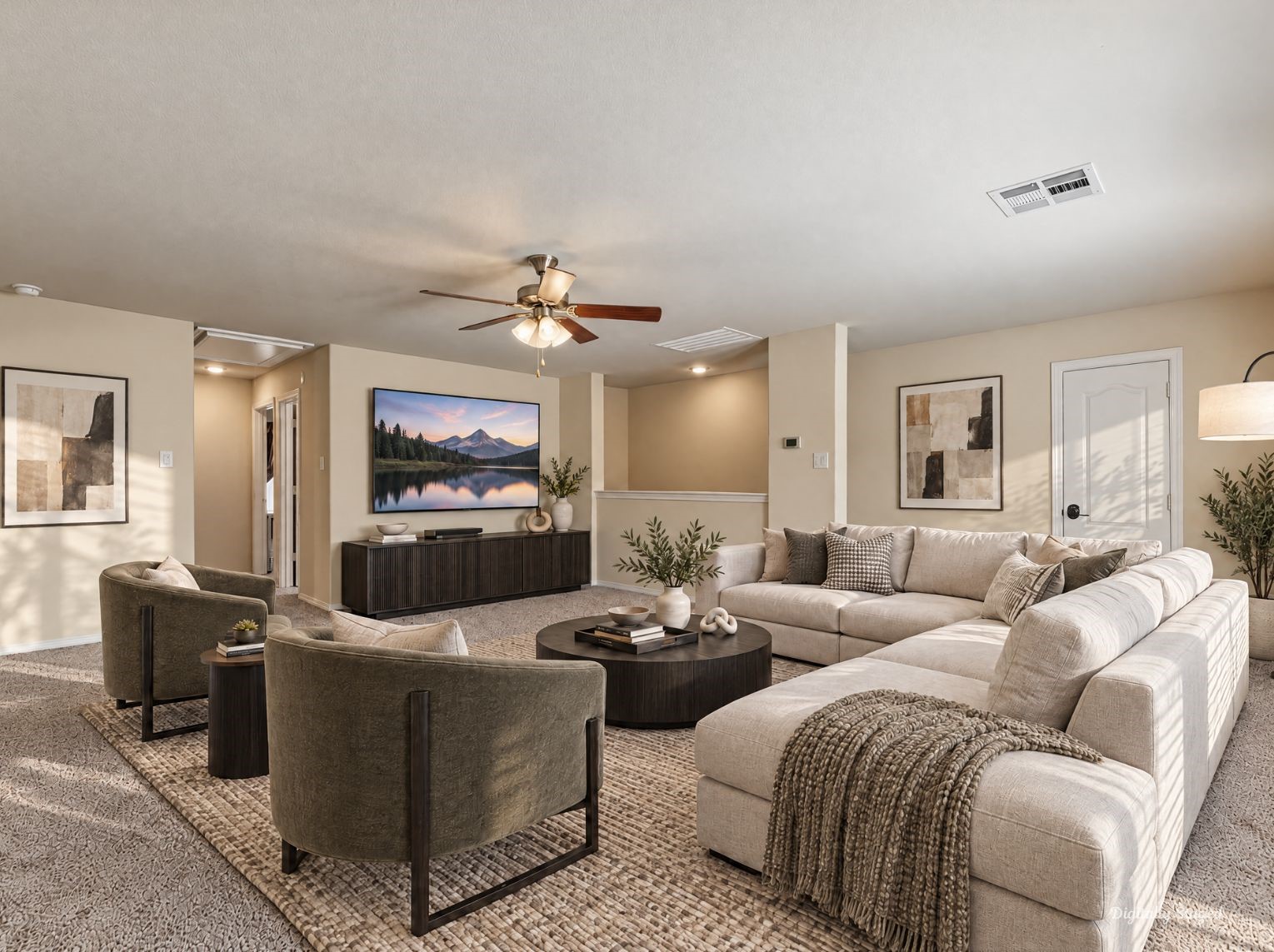 Large upstairs bonus space with warm tan walls, recessed lighting, and a ceiling fan. A half wall with a decorative ledge adds definition, ideal as a media lounge or recreation area.
This photo has been digitally staged to illustrate the possibilities of the homes aesthetic and potential design. Some furnishings and dcor shown are for visual inspiration.