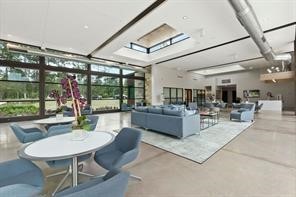 The architecturally stunning clubhouse features clean lines and large windows, housing multipurpose rooms for events, a fitness center, nd shaded outdoor seating  areas perfect for gathering with neighbors.