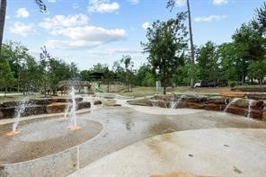 The community's extensive amenities include a
modern splash pad and water feature area, perfect
for cooling off during the summer months.
Surrounded by mature trees and natural stone
accents, this park-like setting provides endless
outdoor entertainment for residents.