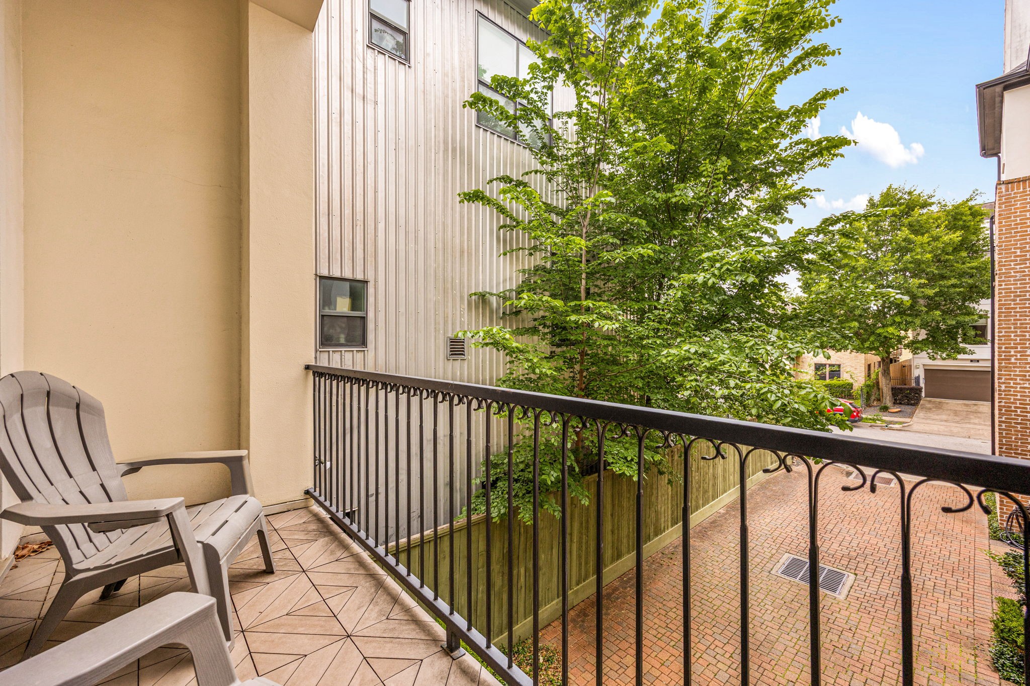 The charming balcony provides a peaceful spot to relax outdoors.