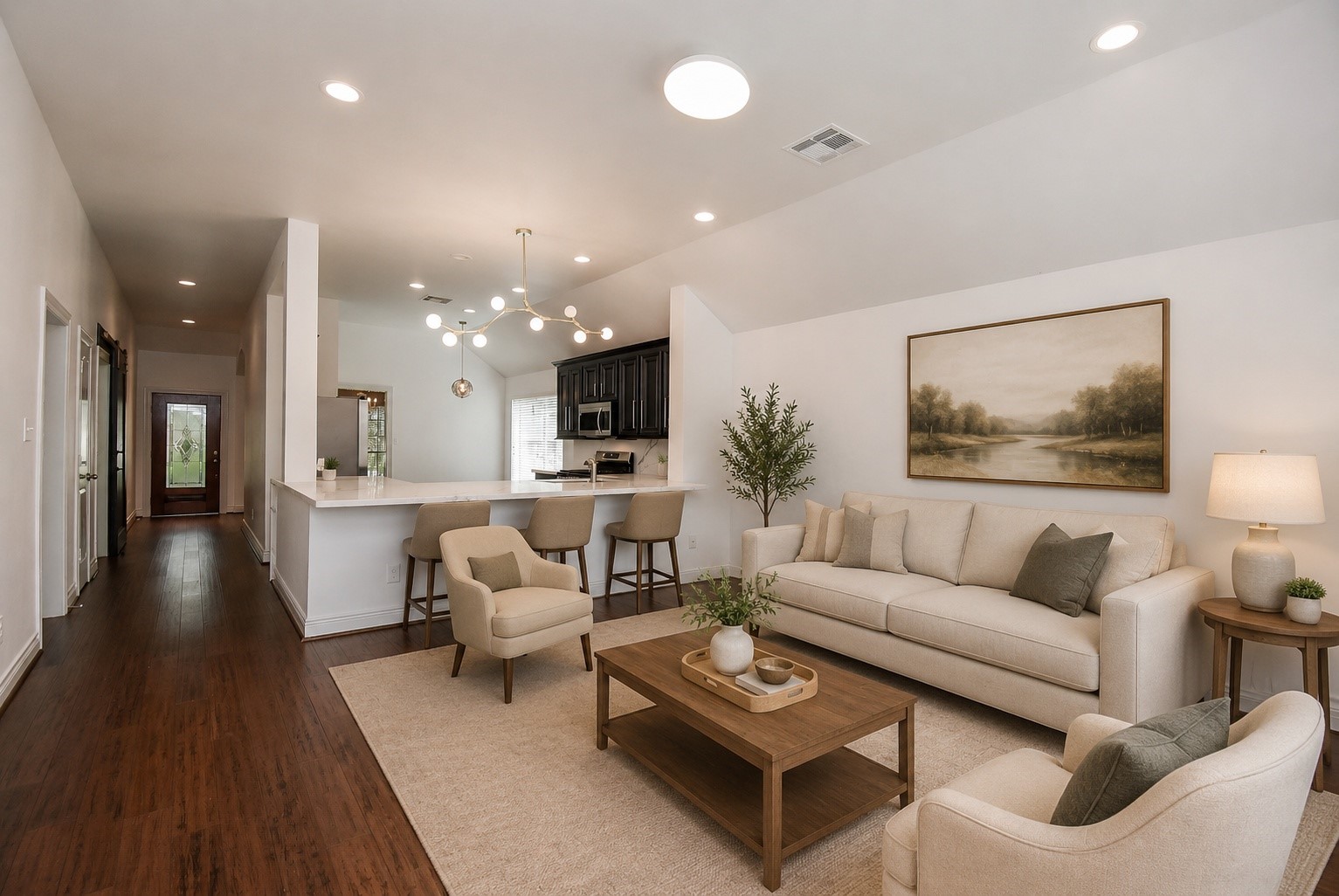 The spacious family room serves as the heart of the home, offering an open-concept design that flows seamlessly into the kitchen and breakfast area. Filled with natural light and thoughtfully designed for both everyday living and entertaining, this inviting space is perfect for gathering with family and friends. Virtually Staged.