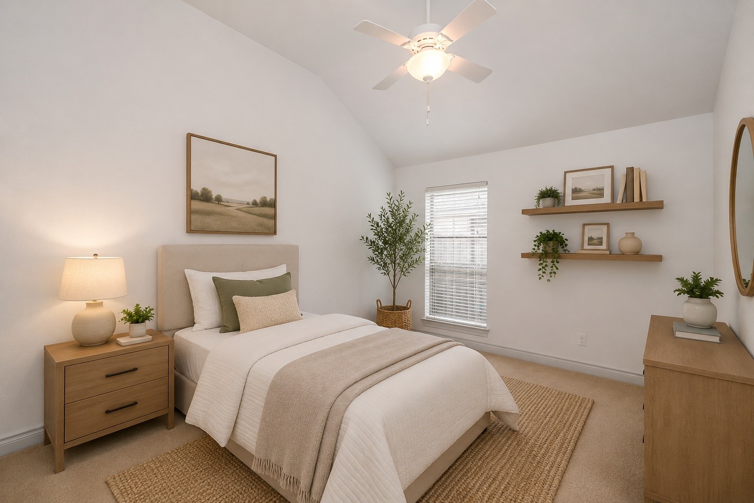 A spacious and inviting third bedroom featuring vaulted ceilings, abundant natural light, and a versatile layout. Beautifully staged with a full-size bed, this room easily accommodates family, guests, or can be transformed into a stylish home office. Neutral finishes and a calming color palette create a warm, move-in-ready space that complements any dcor. Virtually staged.
