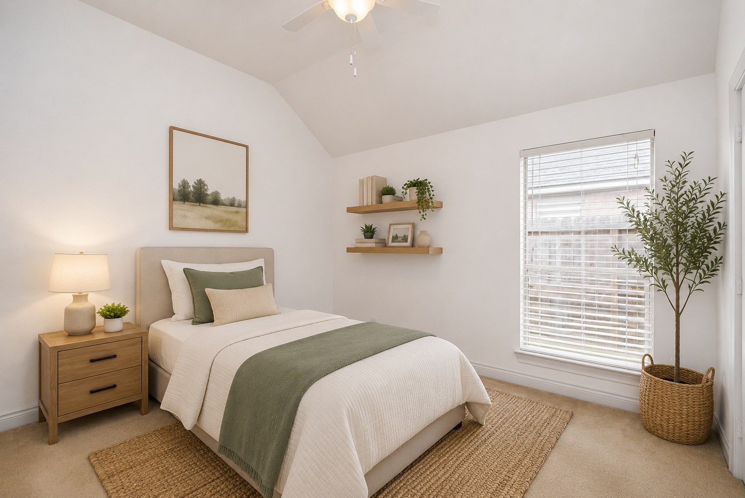 A bright and versatile secondary bedroom featuring vaulted ceilings, abundant natural light, and a spacious closet. Beautifully staged with a twin bed, this room is ideal as a child's bedroom, guest suite, or comfortable home office. Its neutral palette provides a blank canvas to suit any dcor style while creating a warm and inviting atmosphere. Virtually Staged.
