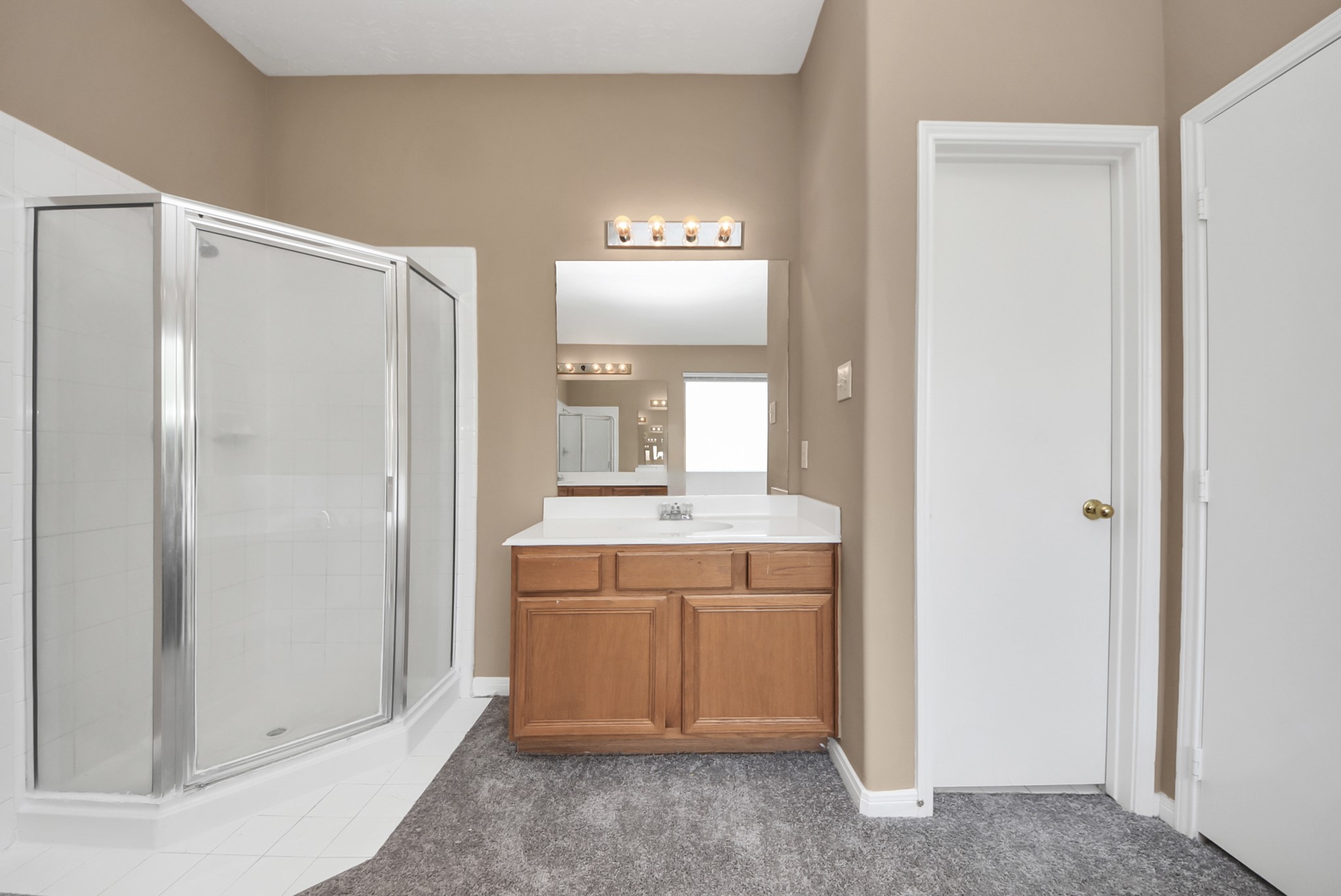 Second sink is located on this side of the bathroom, along with the walking shower.