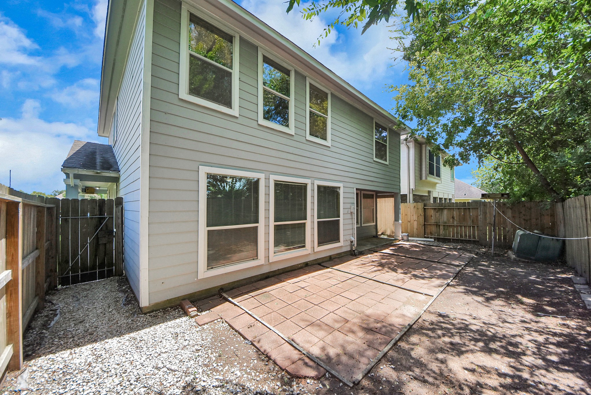 Enjoy a low-maintenance backyard with plenty of potential to create your own relaxing outdoor space.
