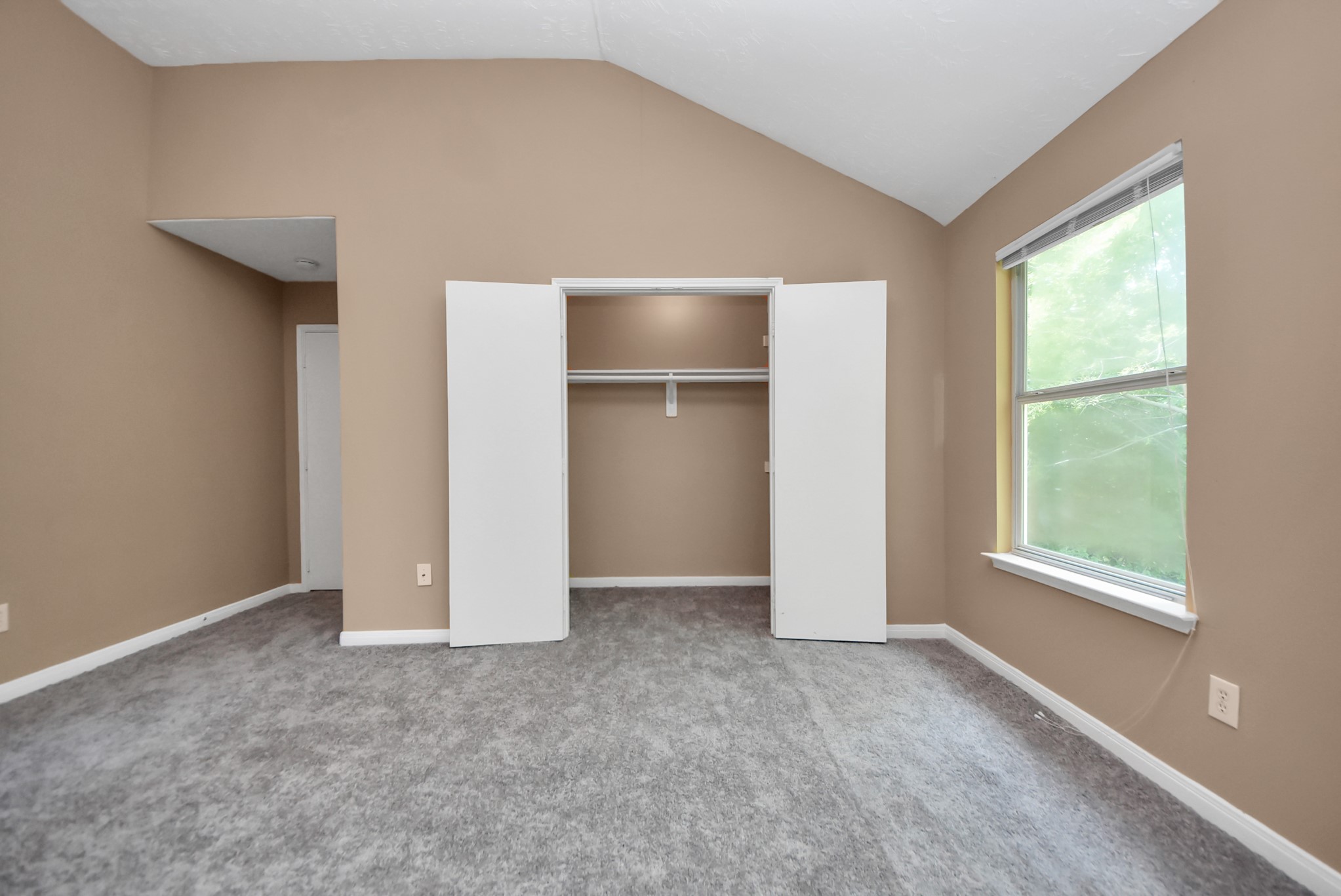 This is one of two closet in the primary bedroom.