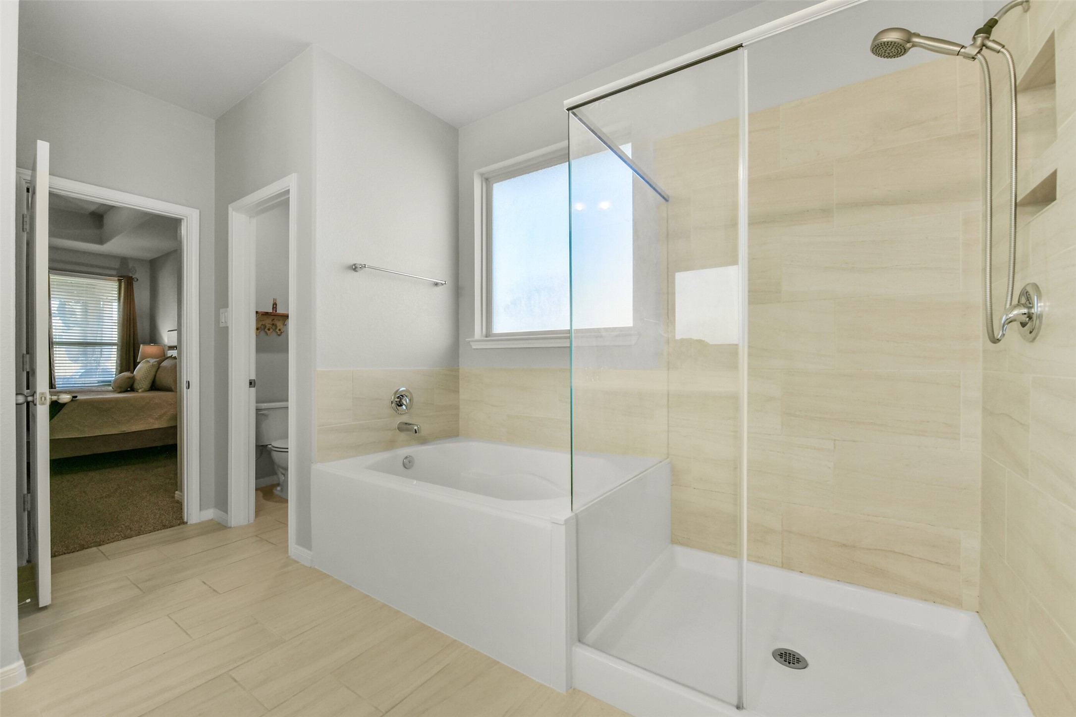 Separate garden tub and oversized separate shower