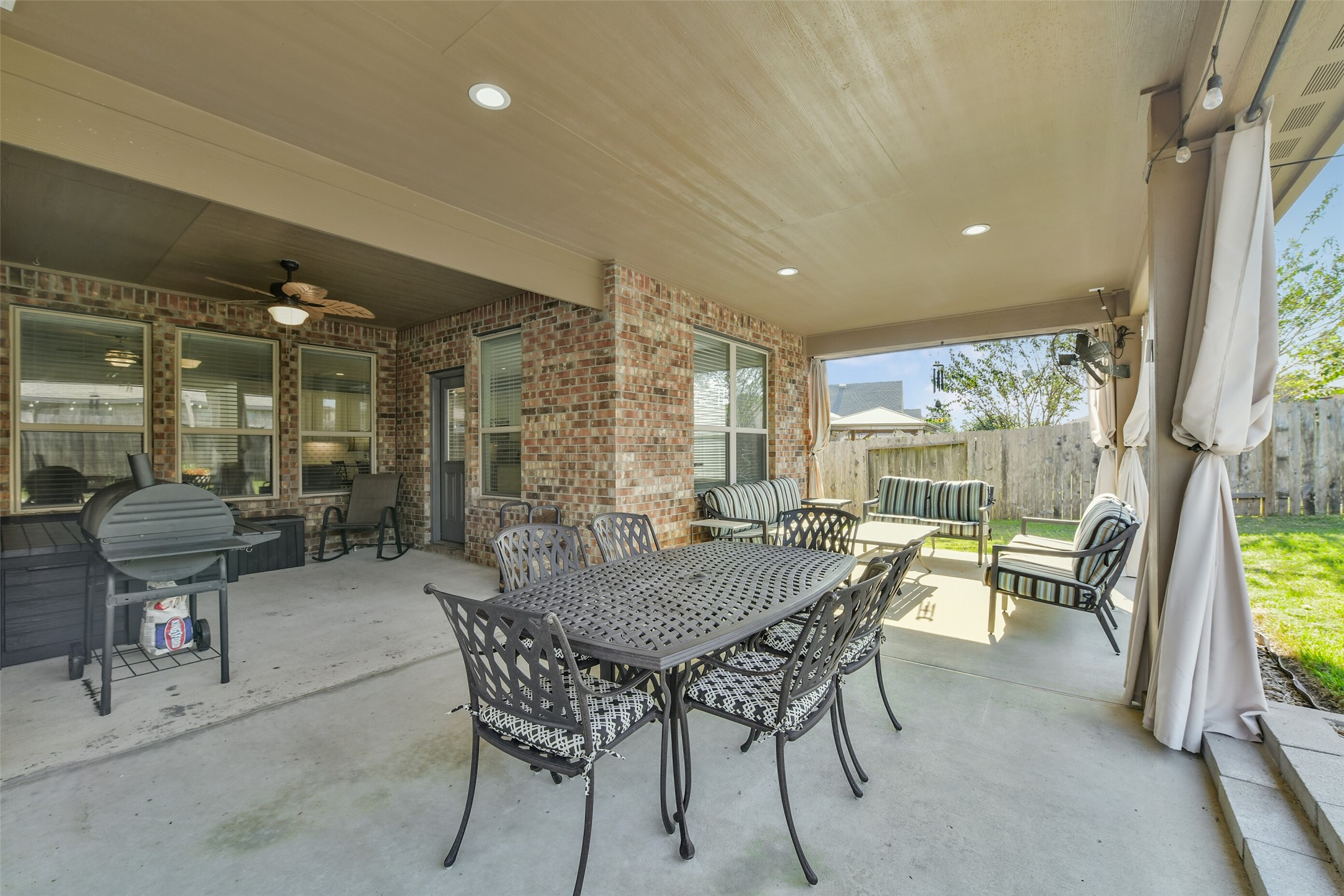 Oversized covered patio 39'x12'+ with recess lighting, countertops & kitchen area & privacy shade curtains