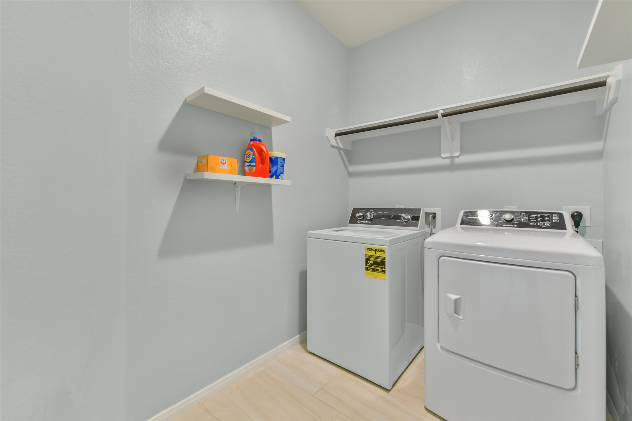 Large utility room with shelves