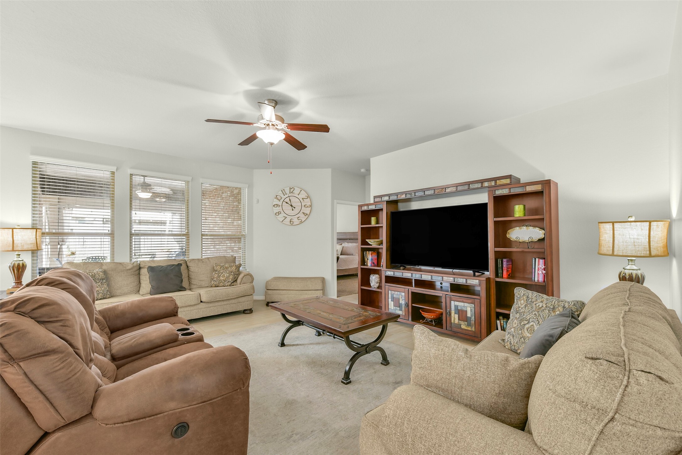 Neutral paint and tile floors for your large living area.