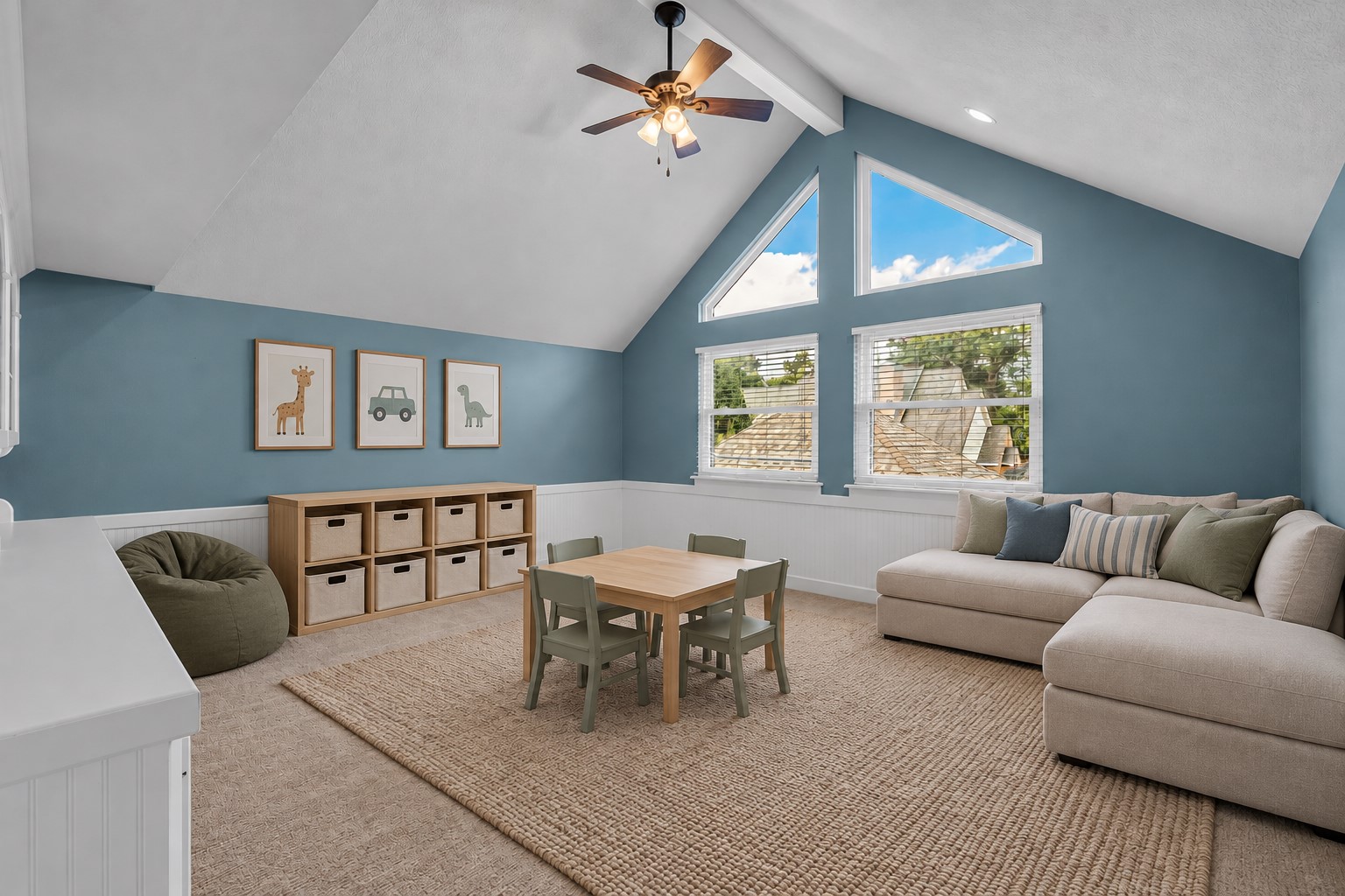 *VIRTUALLY STAGED* Upstairs game room with vaulted ceiling and built-in shelving.