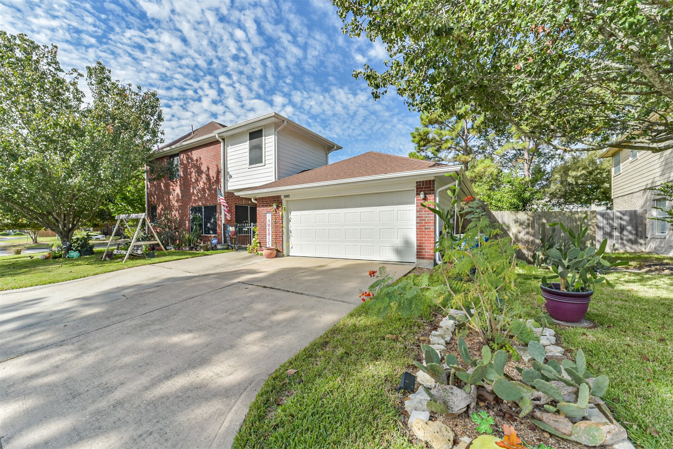 Double wide driveway with additional parking.