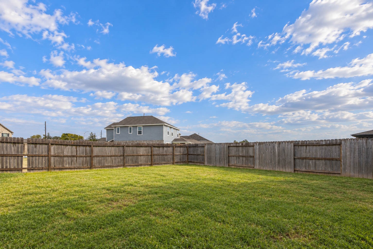 Whether you envision a play area, lush garden, or outdoor entertaining space, this versatile backyard offers endless possibilities to make it your own! Best of all, enjoy the added privacy of having no immediate rear neighbors!