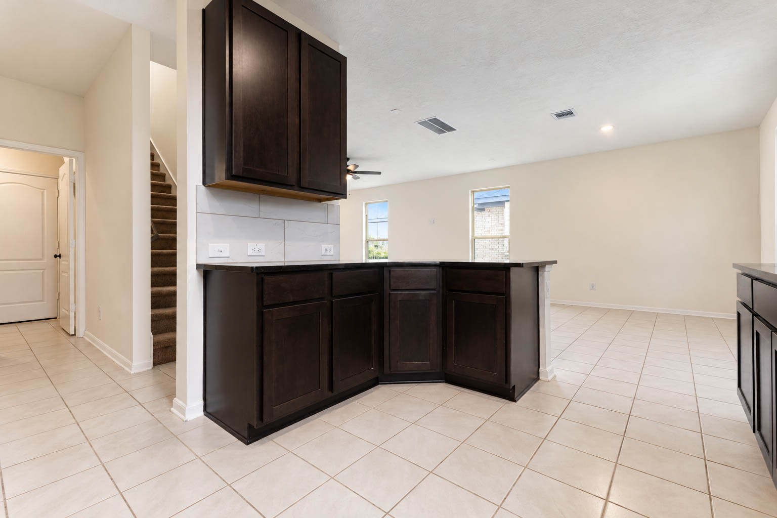 The seamless open-concept layout allows for effortless entertaining & easy conversation between the kitchen, dining area, & family room, while abundant cabinetry & generous counter space provide exceptional functionality without sacrificing style.