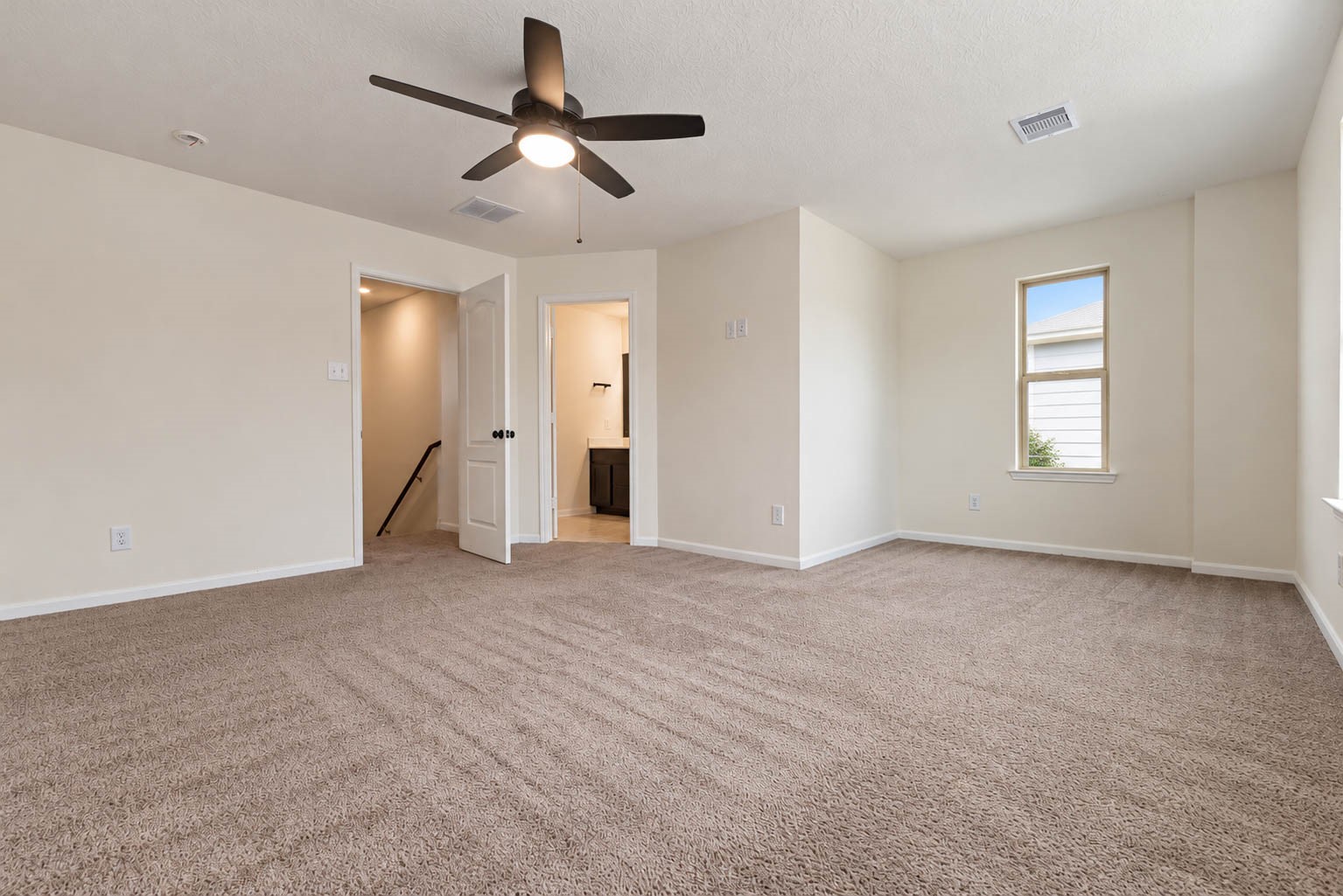 Retreat to the expansive second-floor primary suite, a peaceful sanctuary designed for comfort & relaxation.