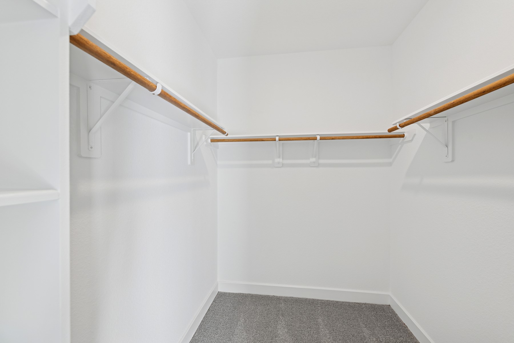 Primary walk-in closet (*Photo not of actual home and used for illustration purposes only.)