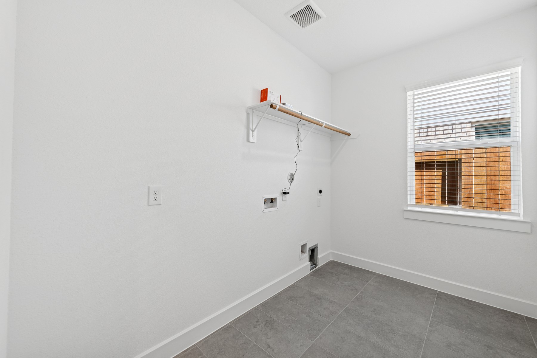 Laundry room (*Photo not of actual home and used for illustration purposes only.)