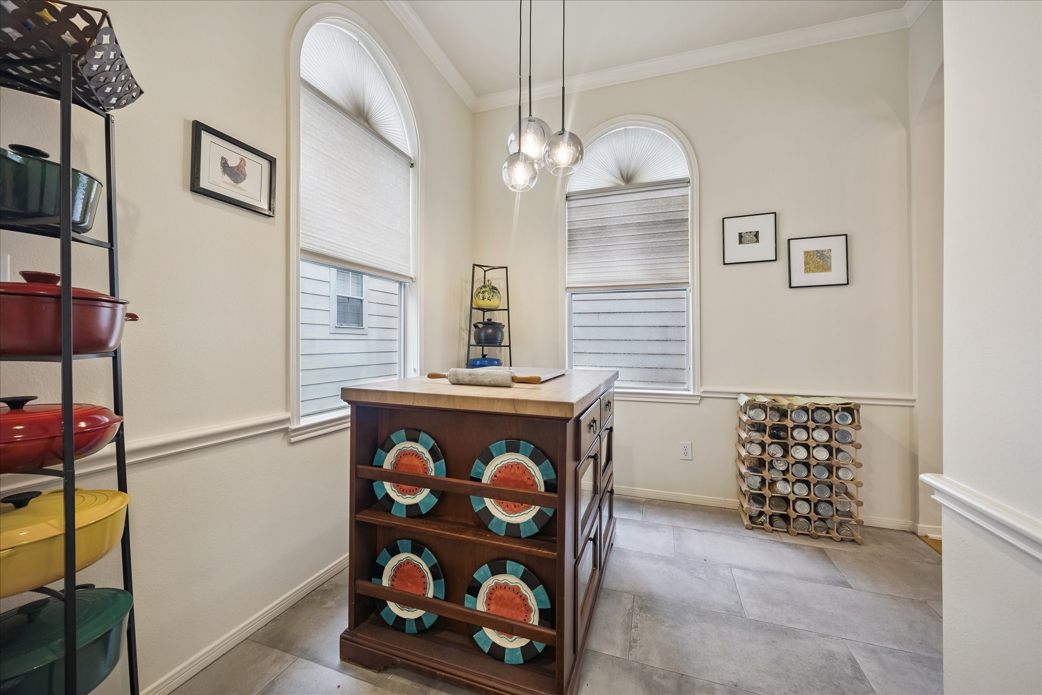 This is the Breakfast area where the owner  has a floating island. Great windows for your breakfast table.