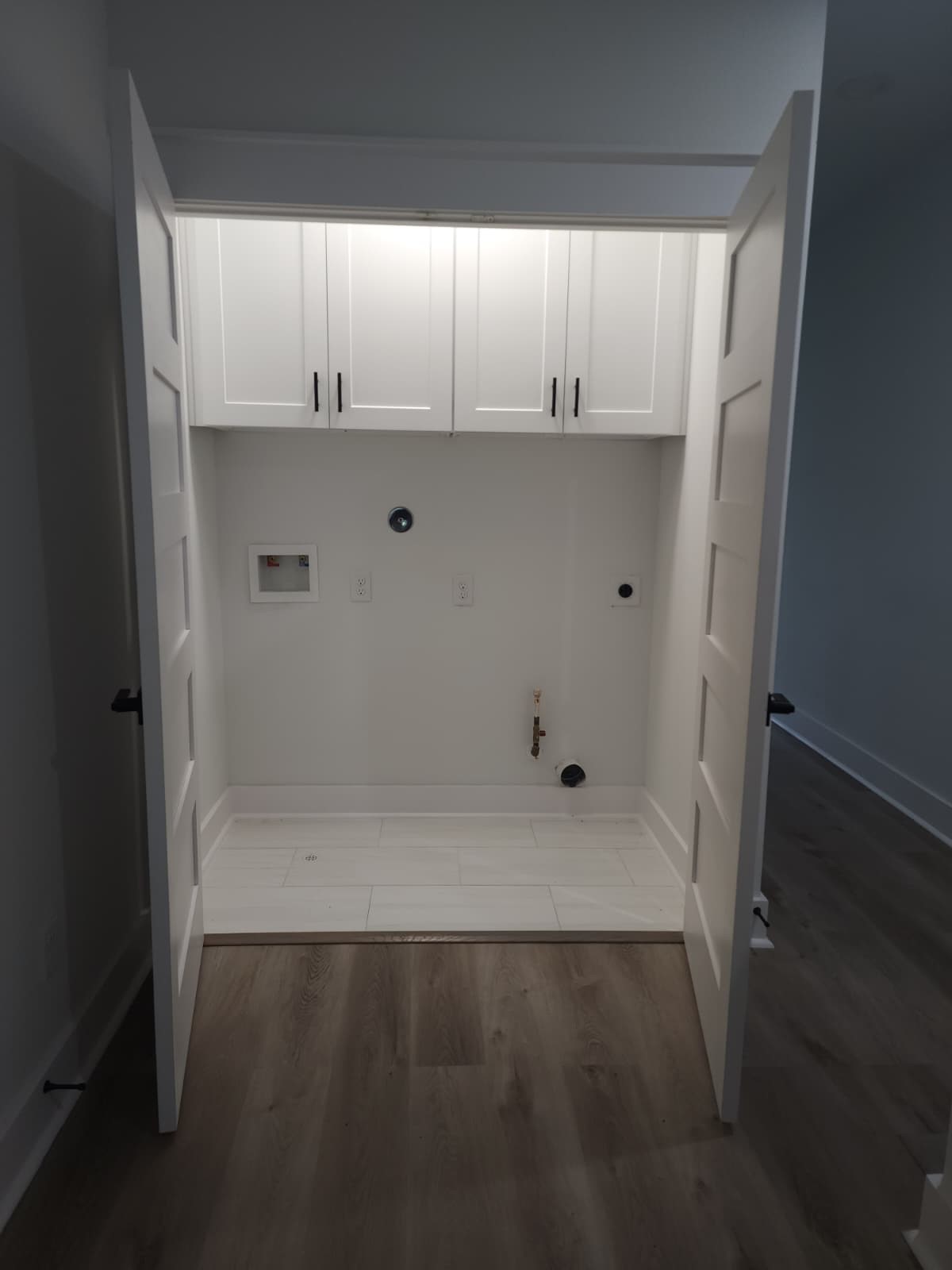 LAUNDRY PREPS IN AN ENCLOSED CLOSET ON THE 2ND FLOOR MAKES THE WORK SO MUCH EASIER