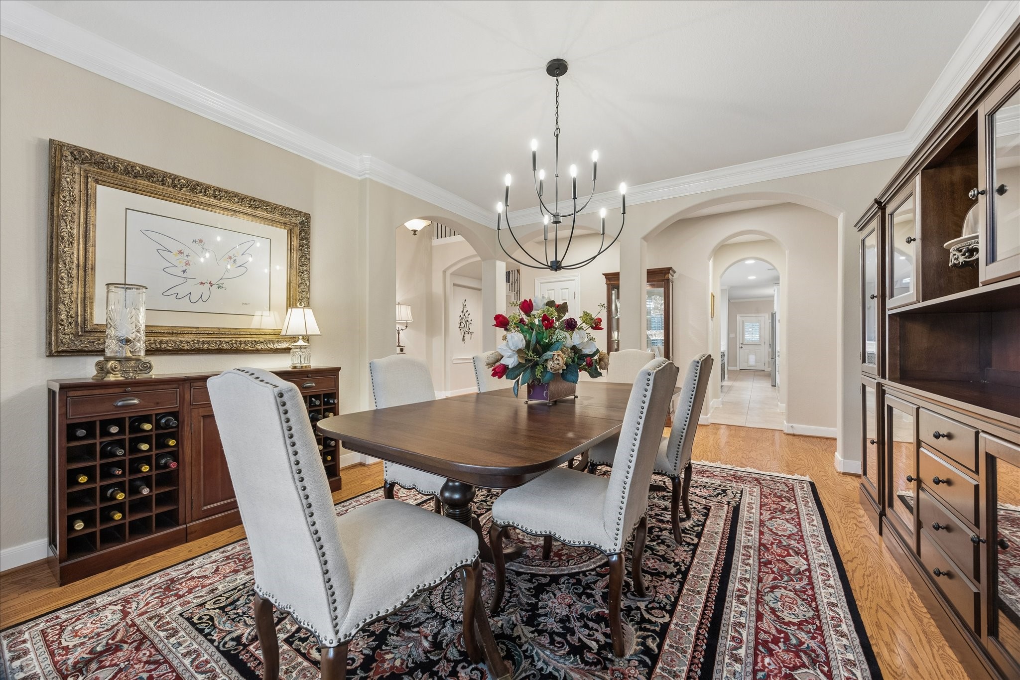 Host with ease in this thoughtfully appointed formal dining room, where seamless access to the butlers pantry keeps serving and entertaining a breeze.