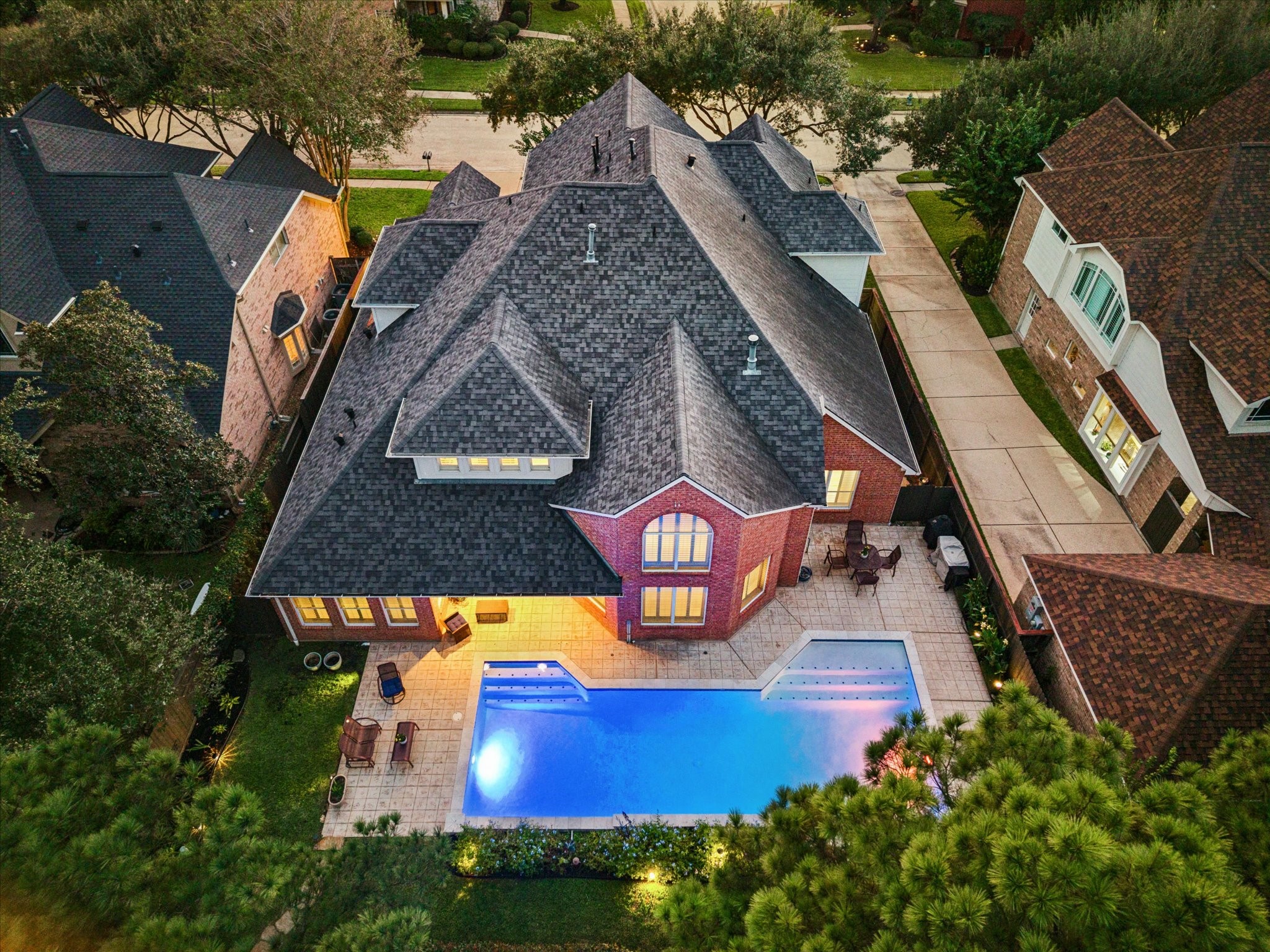 A covered patio opens to your private pool, extending outdoor living with direct access to the trail and peaceful greenbelt behind the home. A covered patio opens to your private pool, extending outdoor living with direct access to the trail and peaceful greenbelt behind the home.