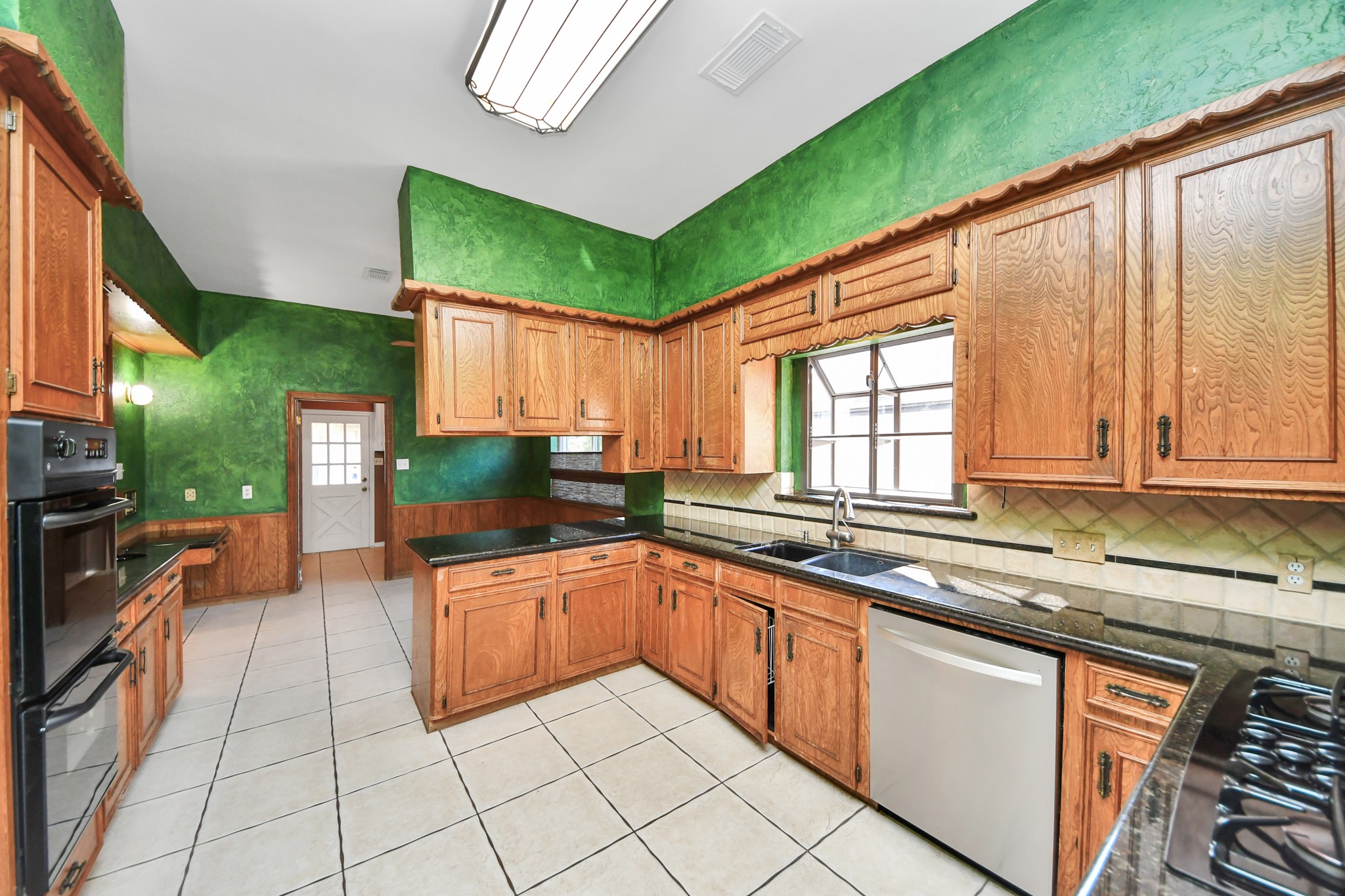 Storage, storage, storage! Extensive cabinetry and counter space create a fantastic starting point for an updated kitchen. Storage, storage, storage! Extensive cabinetry and counter space create a fantastic starting point for an updated kitchen.