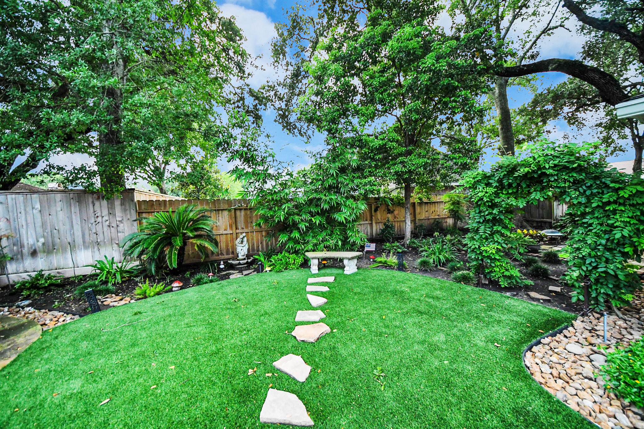 Lots of grass in the "secret garden" behind the garage.