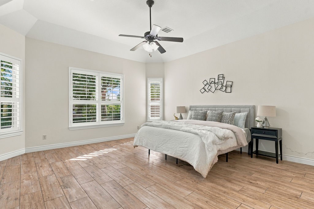 One of the 4 spacious bedrooms, serving as a bright and private retreat.