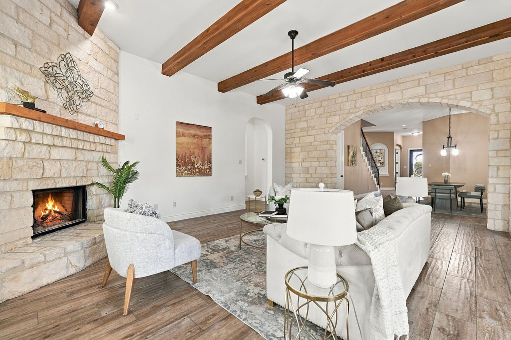 Relax by the floor-to-ceiling stone fireplace that centers the main living area.
