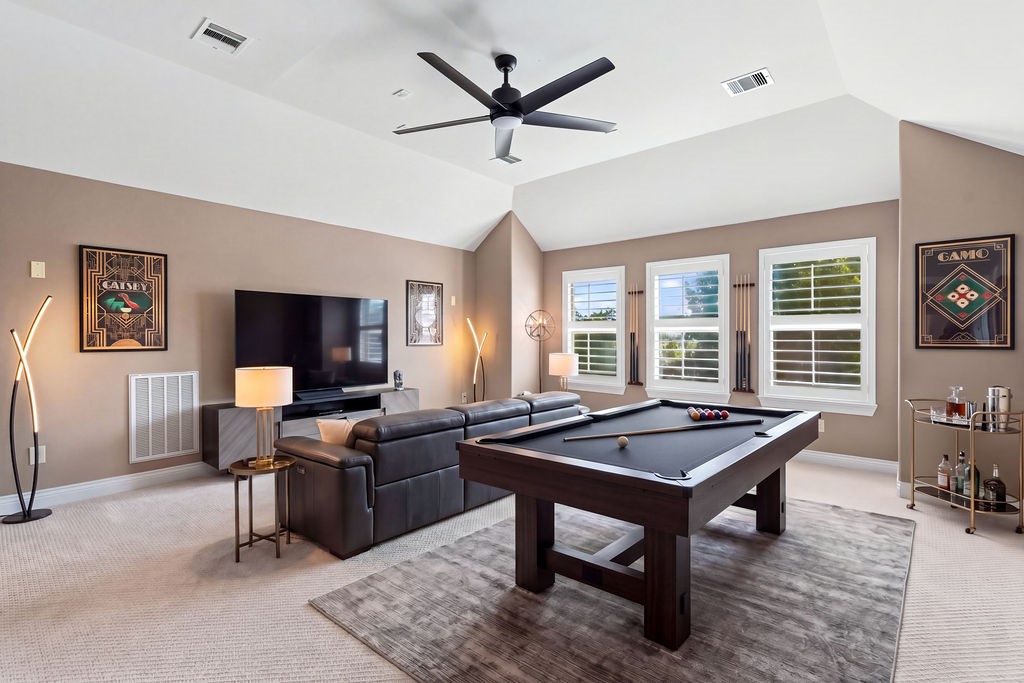 Virtually staged game room/flex space that could be used as a 4th bedroom as well.