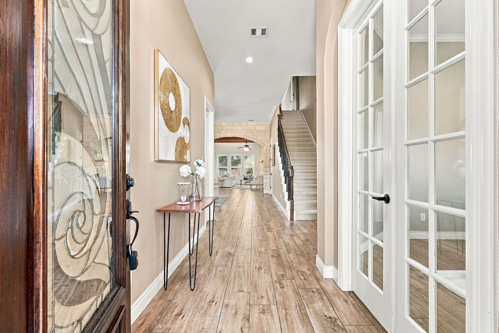 Step into a bright and open entryway with beautiful wood floors. Step into a bright and open entryway with beautiful wood floors.