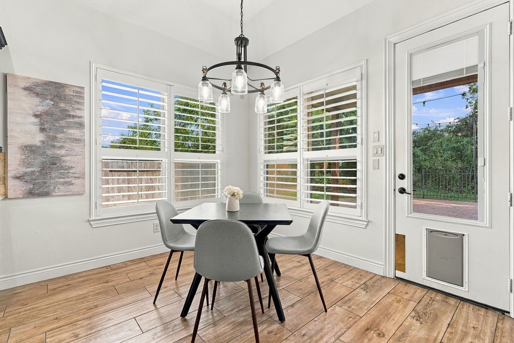 Bright breakfast area with beautiful plantation shutters.