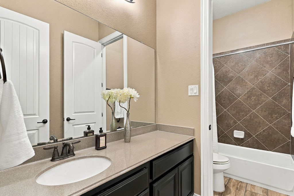 Bright finishes and clean lines in the primary bath.