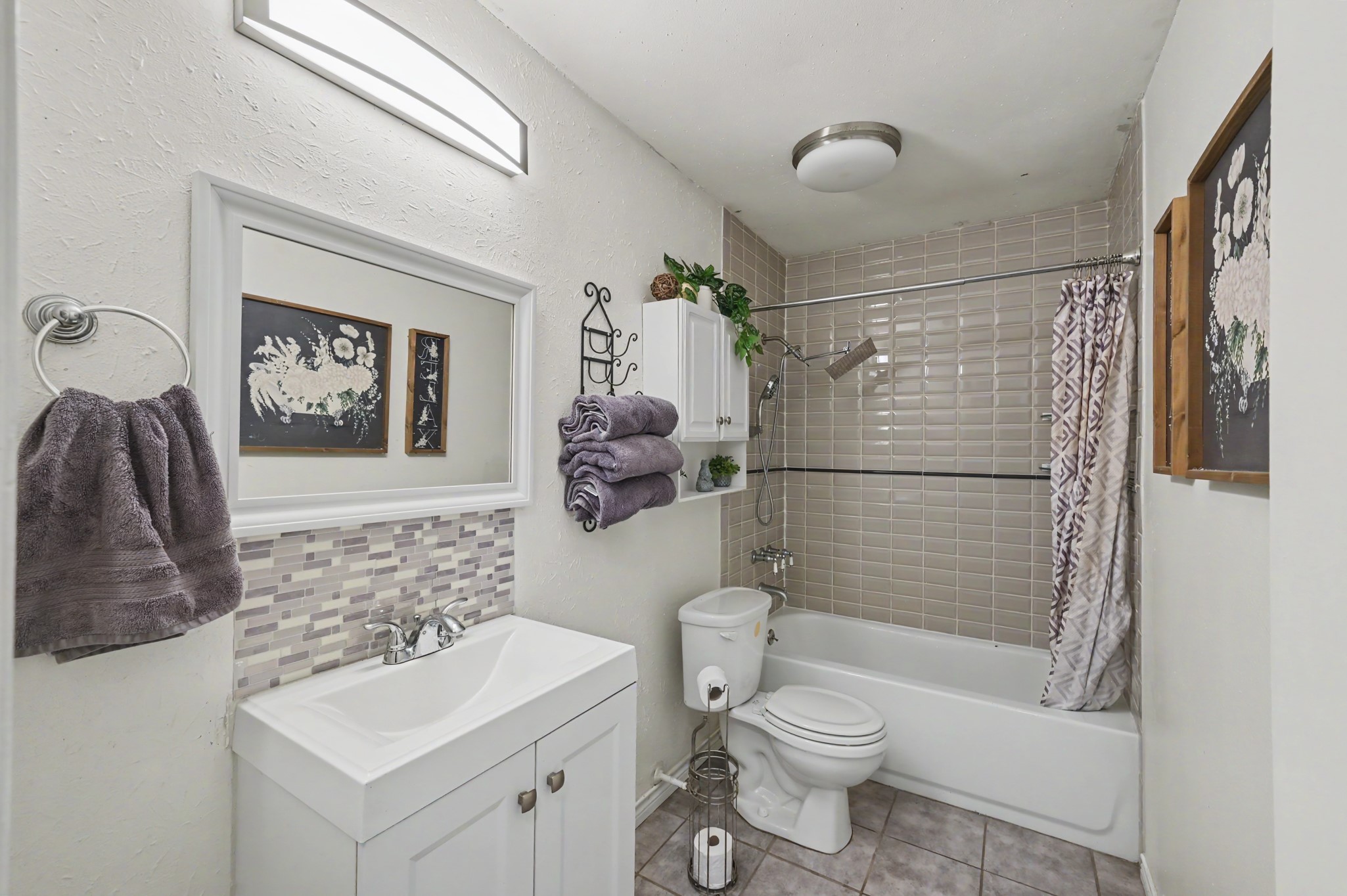 Updated guest bathroom with modern finishes.
