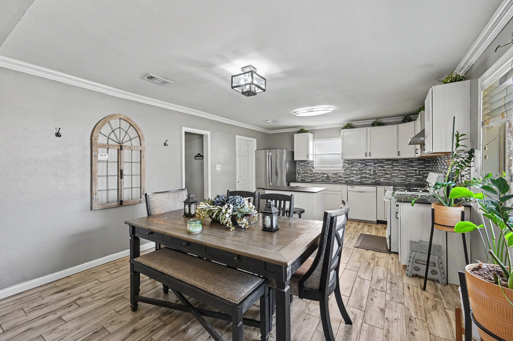 Spacious kitchen and dining area combo.