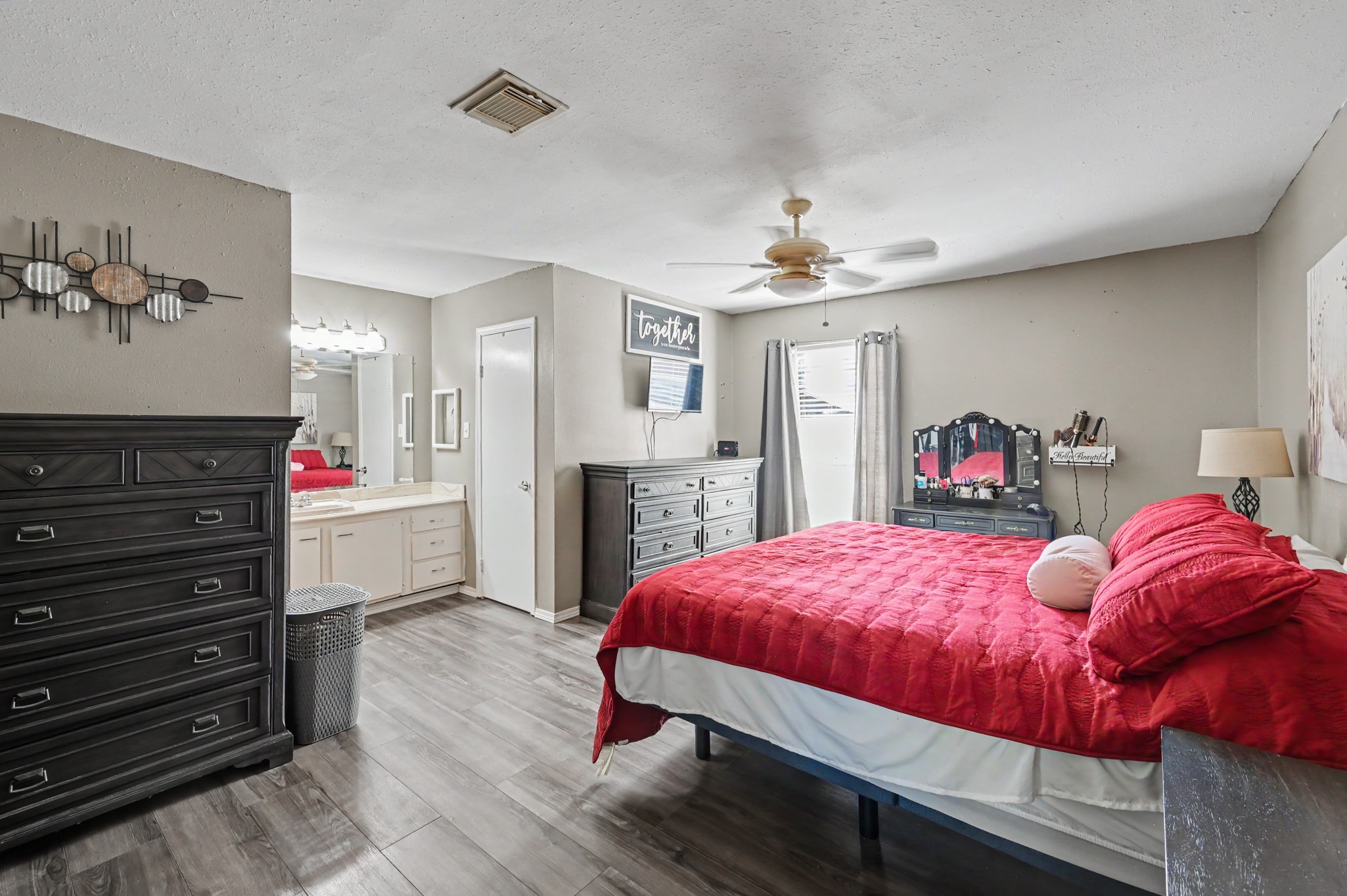 Primary suite featuring a spacious layout with ample room for furniture and decor.
