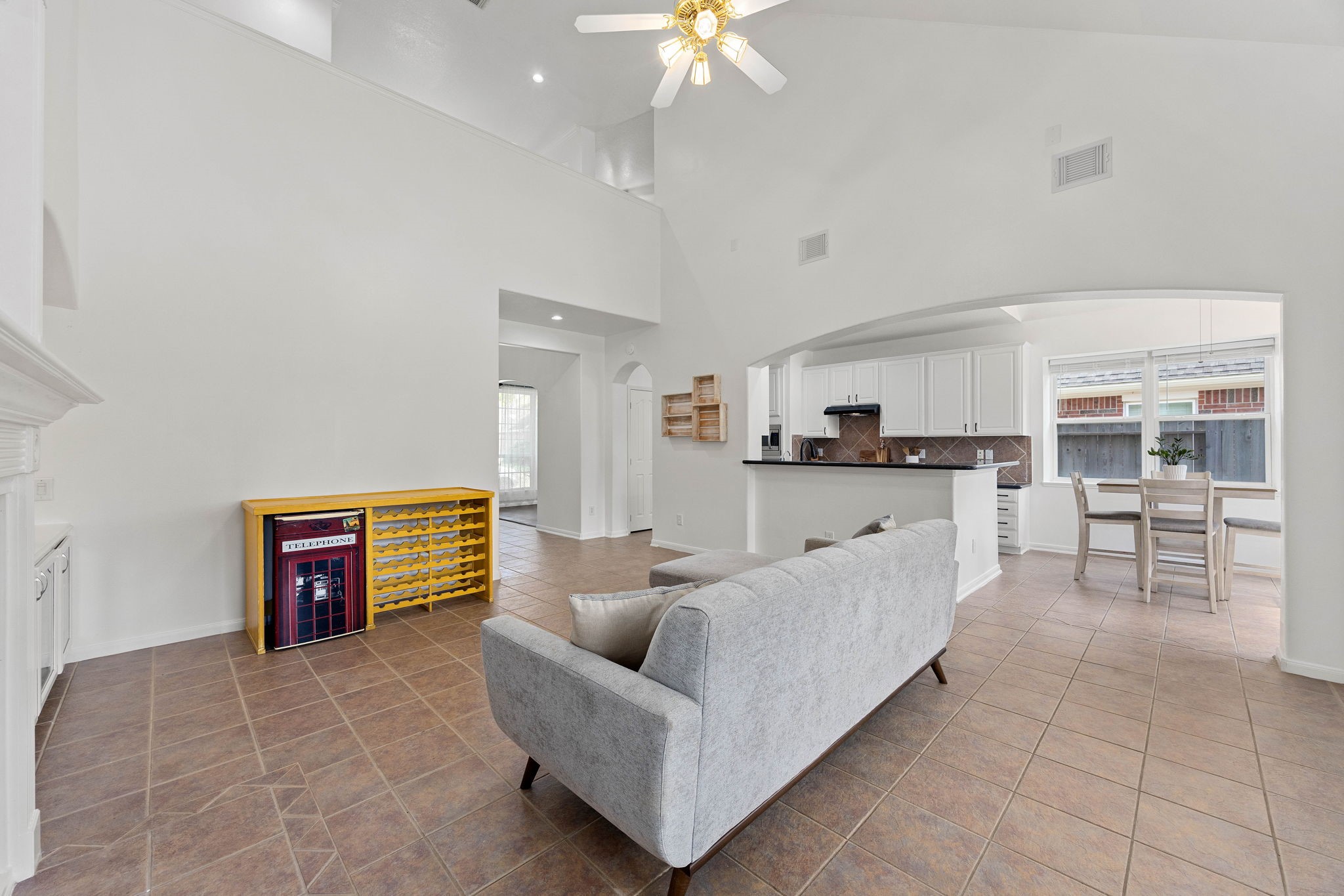 Open-concept living area offering generous natural light and a seamless flow into the kitchen and adjoining spaces.