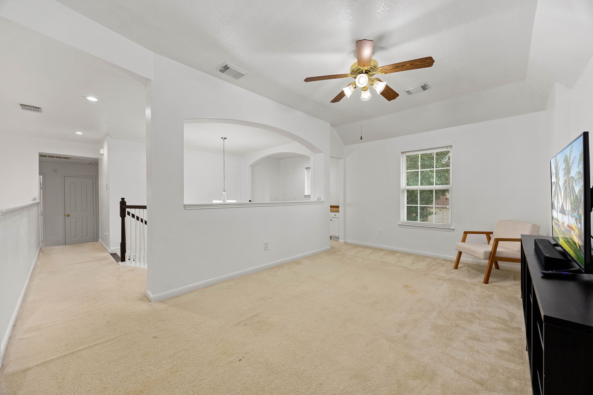 View of the gameroom showcasing the generous floor space and open layout for a variety of uses.
