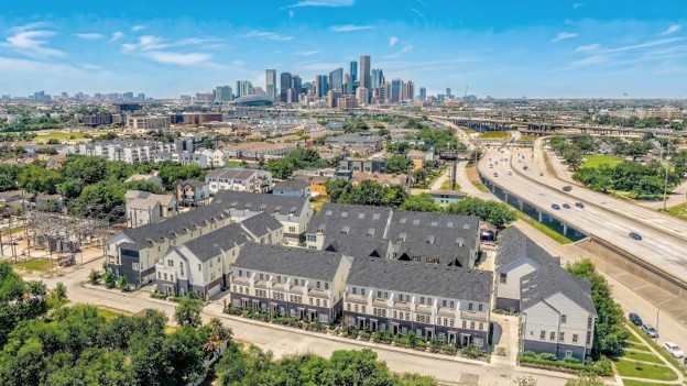 The Upper East River community against the backdrop of the amazing Downtown Houston skyline with I-10 on the right.